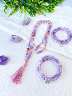 This japa mala necklace is made with 108 natural stone 6mm beads of amethyst and cherry quartz adorned with silver beads. This prayer garland  is the perfect support garland for counting mantras during your practices. Its a 108 6mm lovely beads mala, very light weight and delicate, a spiritual sacred jewelry for chakra healing. All our malas are very versatile, since you can use them on many occasions.hanging from the neck, with a turn or two on the wrist, with several turns. I make each mala by Lavender 8mm Beads Jewelry For Healing, Lavender Spiritual Jewelry With 8mm Beads, Spiritual Lavender Jewelry With 8mm Beads, Lavender Spiritual Jewelry With Beads, Spiritual Rose Quartz Jewelry With 8mm Beads, Amethyst 8mm Beads Jewelry For Meditation, Adjustable Natural Stones Mala For Meditation, Rose Quartz 108 Beads Jewelry For Meditation, Spiritual Rose Quartz Beaded Necklaces For Healing