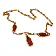 "Magnificent Ornate 10K Yellow Gold Filigree Necklace with inset rectangular Carnelian stones that feature carved Crystal tops with ornate foliate and scroll decorations. c.1910. This wonderful necklace measures 16 1/16\" long with a 1 5/16\" long dangle and weighs 14g. The two smaller Carnelian and carved crystal stones measure 15mm x 7mm, while the larger stone measures 18mm x 10mm. Eb7001" Vintage Amber Rectangular Jewelry, Gold Art Nouveau Jewelry With Intaglio, Vintage Yellow Gold Intaglio Necklace, Vintage Jewelry With Gold Rectangular Stone, Vintage Formal Necklace With Rectangular Pendant, Vintage Formal Necklace With Rectangular Links, Vintage Rectangular Intaglio Jewelry, Antique Engraved Rectangular Necklace, Antique Rectangular Engraved Necklace