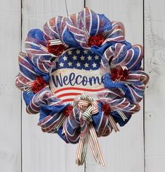 a patriotic wreath with the words welcome on it