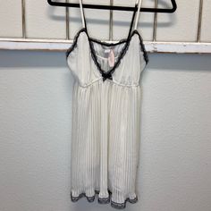 Victoria Secret White And Black Chemise Size M Chic Sleepwear With Lace Trim, White V-neck Coquette Sleepwear, White Casual Camisole For Night Out, White Summer Cami Nightgown, White V-neck Chemise For Loungewear, White Lace Trim Camisole For Night, White V-neck Chemise For Sleep, Victoria's Secret V-neck Camisole For Sleep, Victoria's Secret V-neck Camisole For Daywear