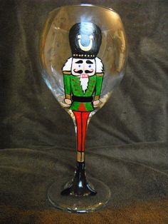 a wine glass with an image of a nutcracker on it