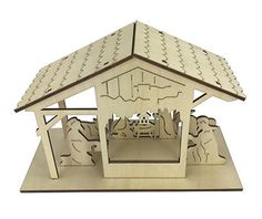 a wooden nativity scene with sheeps and a manger