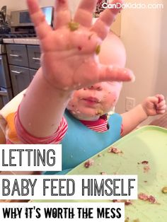 a young child with food all over his face and hands in front of him, while the text reads letting baby feed himself why