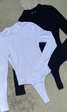 The Layla bodysuit comes in black or white turtleneck style thong bodysuit with snap button closure at the crotch. Made with a comfortable blend of cotton and spandex, this turtleneck bodysuit is perfect for any occasion. 95% Cotton 5% Spandex Turtleneck Style, Turtleneck Bodysuit, White Turtleneck, Body Suit, Snap Button, Cosplay Costumes, Turtle Neck, Style Inspiration, Spandex