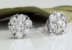 Exquisite 1.60 Carats Natural VVS Diamond 14K Solid White Gold Stud Earrings Amazing looking piece! Suggested Replacement Value $5,800.00 Total Natural Round Cut Diamonds Weight: 1.60 Carats (both earrings) VS1-VS2 / G-H Diameter of the Earring is: 9mm Total Earrings Weight is: 2.1 grams Disclaimer: all weights, measurements and colors are approximate and may vary slightly from the listed dimensions or as seen in the image. All pictures are magnified to show the smallest of details. Please, refe Luxury Cluster Earrings With Vvs Clarity For Anniversary, Luxury Vvs Clarity Cluster Earrings For Anniversary, Gia Certified Fine Jewelry Cluster Earrings For Wedding, Luxury Round Cut Cluster Earrings For Anniversary, Luxury Cluster Earrings With Prong Setting For Anniversary, Luxury Cluster Earrings For Anniversary, Luxury Brilliant Cut Cluster Earrings For Anniversary, Gia Certified Cluster Earrings For Formal Occasions, Luxury Oval Cluster Earrings For Anniversary