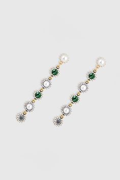 This sumptuous piece of jewelry features a retro-elegant yet slightly modern style that complements the lavish garments, reminiscent of the roaring 1920s. Features: Stunning crystals and alloy Premium color matching Pearl studded design Total length: 4.02"/ 10.21cm Embellished Dangle Jewelry For Party, Chic Embellished Jewelry For Formal Occasions, Embellished Metal Jewelry For Formal Occasions, Elegant Embellished Earrings, Formal Embellished Metal Jewelry, Embellished Elegant Drop Earrings, Elegant Embellished Drop Earrings, 1920s Pearl Earrings, Elegant Green Dangle Tassel Earrings