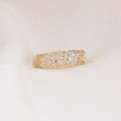 Hand-carved band available in 14k Yellow, White, or Rose Gold, set with a total of 52 (0.67 ct.) White Diamonds. A disco-party on the go! This luminous, luxe, luxurious discothèque Divinité band embodies shimmering, effervescent, exuberant Love. Love is Sacred and Divine - it is the miraculous gift of the Holy Spirit, making up the world we live in. A reminder to keep love at the forefront of all you do, a token of celebration and joy, a talisman of your angels guiding you through unconditional Party Diamond Ring With Accents In Yellow Gold, Yellow Gold Diamond Ring With Accents For Parties, Gold Rings With Pave Setting For Party, Dazzling Yellow Gold Rings For Party, Party Yellow Gold Diamond Ring With Accents, Dazzling Yellow Gold Party Rings, Party Diamond Ring In Yellow Gold, Party Yellow Gold Jewelry With Pave Setting, Party Yellow Gold Diamond Ring