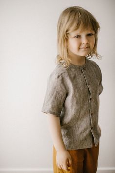 Breathable and comfy, 100% organic linen fabric shirt for toddler boys. It has short sleeves and button up design, and is created for the most comfort of your little boys. Choose any of 25 colors according to your liking. This linen top for boys can be worn on everyday, or for special occasions, for birthdays, wedding, kids parties, or any other occasion. Besides, all organic linen clothes are breathable and ensure air circulation, so your child won't feel overheated. Linen shirt is also machine First Birthday Shirt Boy, Baby Boy First Birthday Outfit, Ring Bearer Shirt, First Birthday Shirt, Baby Boy First Birthday, First Birthday Outfit, Shirt For Boys, White Linen Shirt, First Birthday Shirts