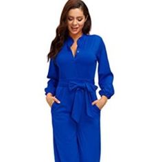 *Material: Polyester & Spandex. Made Of Good Quality And High Elasticity Fabric. It Is Comfortable And Stretchy *Features: Solid Color, Long Sleeve, Stand Collar, Button Up, Belt, Wide Leg, Straight Leg, Pockets, One Piece Jumpsuit *Pair With High Heels Or Sandal To Make A Modern/ Elegant Female Look. *Wide Leg Design Is Very Comfortable For Daily Wear And Work. Blue Stretch Jumpsuits And Rompers For Work, Fall Blue Jumpsuits And Rompers For Workwear, Blue Long Sleeve Jumpsuit For Work, Blue Fitted Jumpsuits And Rompers For Work, Suede Jumpsuit, Teal Jumpsuit, Look Wide Leg, Tube Top Romper, Gold Jumpsuit