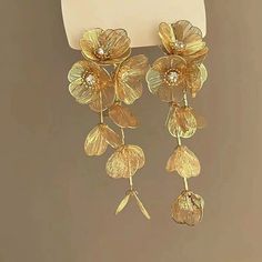 Vintage Golden Hollow Out Flowers Long Tassels Crystal Earrings For Women European American style Jewelry Material: Metal Metals Type: Zinc alloy Style: Hyperbole Shape\pattern: plant Fine or Fashion: fashion Gender: Women Fine or Fashion: Fashion Metals Type: Alloy