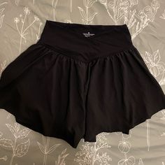 - Never Worn , Perfect Condition. No Flaws. - These Are The Flowy Shorts That Look Like A Skirt. They Have The Spandex Up Under Them. - High Waisted With A Criss-Crossed Front. Casual Black Athletic Shorts With Wide Waistband, Casual Black Shorts With Wide Waistband, Black Casual Short Leg Skort, Black Yoga Bottoms With Short Inseam, Casual Short Skort With Wide Waistband, Casual Athletic Shorts With Wide Waistband And Short Inseam, Black Bottoms With Wide Waistband, Casual Shorts With Wide Waistband And Short Inseam, Black Short Bottoms With Waistband