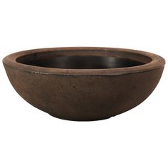 a brown bowl sitting on top of a white surface