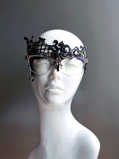 Step into mystery with Midnight Web, a black lace mask designed specifically for eyeglass wearers. The intricate lace pattern seamlessly integrates with eyeglasses, offering a blend of dark elegance and practicality. Perfect for masquerade balls, costume parties, or any event where you want to captivate with your style. Age Group/Gender - Adult/Women Mask Color - Black Size - One size fits all adults Mask Material - Lace Black Lace Mask, Lace Masquerade Mask, Kids Party Packs, Lace Masquerade Masks, Dark Elegance, Female Mask, Lace Mask, Costume Parties, Masquerade Mask