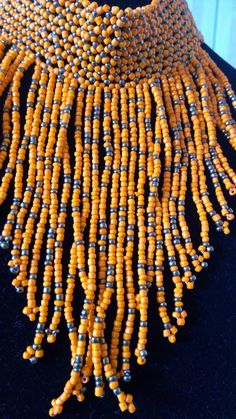 Dainty Choker | Orange Necklace | Multistrand Necklace | Custom Choker | Gift Ideas | Wholesale Necklaces | Customized Necklaces This statement necklace is made from beads. Main Color - Orange. Feel free to send me a convo or e-mail for any clarification or more information. Thank you for visiting, Traditional Orange Beads For Crafting, Traditional Beaded Necklaces With Dangling Round Beads, Traditional Beaded Necklace With Dangling Round Beads, Bohemian Orange Beads For Jewelry Making, Artisan Orange Beaded Necklaces For Festivals, Traditional Silver Beaded Necklaces For Festivals, Traditional Silver Beaded Necklace For Festival, Traditional Large Beads Bib Necklaces For Festivals, Traditional Large Beads Bib Necklace For Festivals