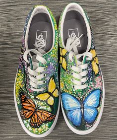 Who else is ready for spring? These shoes are hand painted with vibrant, non-toxic paint, and weatherproof for your lifestyle. Children's sizes are $70 up to size 3.  I can customize the colors/types of butterflies upon request, at no extra cost. Please feel free to message me if you have any questions! Green Custom Sneakers For Spring With Round Toe, Spring Green Custom Sneakers With Round Toe, Hand Painted Low-top Sneakers For Spring, Hand Painted Slip-on Sneakers For Spring, Artistic Multicolor Spring Sneakers, Spring High-top Hand Painted Sneakers, Spring Hand-painted High-top Sneakers, Artistic Low-top Sneakers For Spring, Spring Hand Painted Round Toe Sneakers