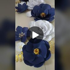 paper flowers are arranged on a table