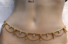 * Beautifully designed gold color belly chain. * can be used with belly dance costumes and saris. * D.no.1- Adjustable from32 to 40 inches Waist. * D.no.2- Adjustable from 32 to 40 inches Waist. * D.no.3- Adjustable from 32 to 40 inches Waist. * D.no.4- Adjustable from 24 to 36 inches Waist. Gold Waist Belt Indian Simple, Ottiyanam Designs Gold Simple, Indian Belly Chain, Waist Chain Indian Bridal, Traditional Waist Chain With Latkans For Festive Occasions, Traditional Festive Waist Chain With Latkans, Traditional Waist Chain With Latkans For Festivals, Elegant Festive Waist Chain, Traditional Waist Chain With Tilla For Party