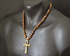 Spiritual Cross Necklace With Polished Beads, Symbolic Brown Pendant Necklace, Spiritual Necklaces With Natural Stones In Cross Shape, Spiritual Cross Necklace With Natural Stones, Symbolic Brown Pendant Jewelry, Release Fear, Tigers Eye Stone, Ankh Cross, Unisex Necklace