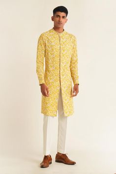 Marigold cotton silk kurta with all over floral jaal print and thread embroidered border. Paired with pant cut pyjama.
Components: 2
Pattern: Embroidered
Type Of Work: Thread and Sequin Work
Neckline: Round Collar
Sleeve Type: Full Sleeves
Fabric: Cotton Silk
Color: Yellow
Other Details: 
Side slits
Kurta Closure: Front loop buttons
Occasion: Sangeet,Mehendi and Puja - Aza Fashions Kurta Set For Men, Silk Kurta, Embroidered Border, Kurta Set, Full Sleeves, Embroidered Silk, Cotton Silk, Round Collar, Aza Fashion