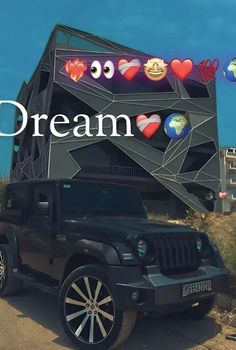 a black jeep is parked in front of a building with hearts and eyes on it