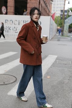 Pre-order status: Ships out in 2-3 weeks. Corduroy blazer jacket in an oversized boxy fit for a rustic vintage look. Double breasted button up closure with side pockets and notched lapels. Lined. XS: 16" across shoulders, 43" chest, 28.5" lengthS: 17" across shoulders, 44.5" chest, 29" lengthM: 18" across shoulders, 46" chest, 29.5" lengthL: 19" across shoulders, 47.5" chest, 30" length Double Breasted Jacket Outfit, Corduroy Notch Lapel Outerwear For Fall, Notch Lapel Corduroy Outerwear For Fall, Fall Corduroy Outerwear With Notch Lapel, Winter Corduroy Blazer For Work, Corduroy Blazer For Winter Workwear, Workwear Long Sleeve Blazer With Corduroy Collar, Workwear Blazer With Corduroy Collar And Long Sleeves, Long Sleeve Blazer With Corduroy Collar For Work