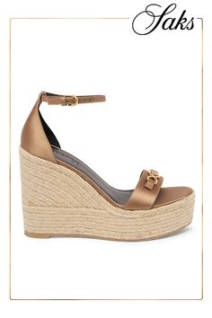 Crafted in Spain, Versace's satin sandals feature an espadrille wedge and logo bit hardware across the toe strap. Open toe Slips on Satin upper Rubber sole Made in Spain SIZE Wedge heel: about 5.5 (140mm) ABOUT THE BRAND Satin Sandals, Espadrille Wedge, Espadrilles Wedges, Wedge Heels, Wedge Sandals, Open Toe, Rubber Sole, Versace, Espadrilles