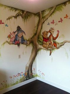 winnie the pooh wall mural in a child's room