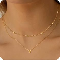 Trendy Layered Initial Letter V Choker Necklace 14k Plated Initial Letter V Pendant Layering Necklace Plating: 14k Gold Plated Main Material: Copper Style: Elegant Initial Letter: V Initial Layering Necklace, V Letter Gold Pendant, Initial Necklace V, V Pendant Necklace, V Necklace Letter, V Initial Necklace, V Pendant, V Necklace, Mangalsutra Design