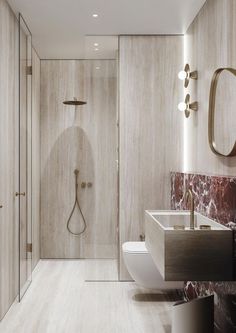 a modern bathroom with marble walls and flooring