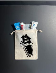 a bag with toothpaste and other items in it