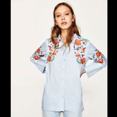 Zara Blue Embroidered Shirt New With Tag Size Medium Color Blue Shoulder 16 Inch Bust 19.5 Inch Length 26-33 Inch Approx Size Measurements Are Approximate Embroidered Long Sleeve Light Blue Blouse, Zara Light Blue Long Sleeve Shirt, Blue Cotton Shirt With Floral Embroidery, Light Blue Embroidered Tops For Spring, Embroidered Collared Blue Tops, Blue Embroidered Collared Blouse, Zara Floral Embroidery Blouse For Spring, Spring Long Sleeve Shirt With Embroidered Sleeves, Zara Floral Embroidered Blouse For Spring