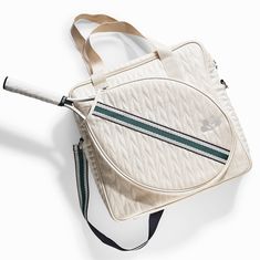 "This Tennis bag is made of the softest most luxurious vegan leather you have ever felt. In addition to the million dollar look we believe in design of safe-to-use products and material quality.  The material used is REACH compliant. REACH, which stands for Registration, Evaluation, Authorization, Restriction of Chemicals, aims to better protect health and the environment. Crafted with quilted, water and tear-resistant fabrics, these tennis bags protect your rackets and gear. Separate compartments accommodate your racket, while slip pockets and dedicated internal pockets keep your wallet, phone, water bottle, and ball can organized. Complimentary Shoe Bag and Versatile Carrying Options: Each Tennis bag includes a matching shoe bag, ensuring your footwear stays protected and organized along Pickleball Bag, Tennis Bags, Tennis Bag, Pickleball Gift, Pickle Ball, Sports Bags Gym, Smells Good, Sports Gym, Gym Bags