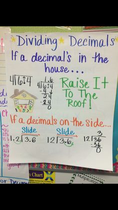 a bulletin board with writing on it that says dividing decimals if a demons in the house raise it to the roof