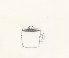 a drawing of a coffee cup with a smiley face on it