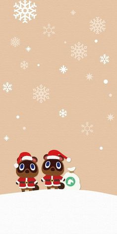 two brown bears wearing santa hats on top of a snow covered hill with snowflakes