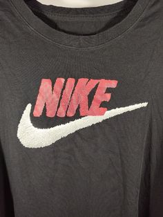 The Nike Tee Shirt Men's Size Xxl Black Swoosh Graphic Short Sleeve T-Shirt Euc Dimensions 27 X 29 Excellent Condition, No Holes Or Stains, Smoke Free Returns Require Unworn And Undamaged Condition As Delivered #Bp. V Nike Sports Tops With Graphic Design, Nike Graphic Design Sports Top, Nike Retro Tops With Letter Print, Nike Retro Tops For Streetwear, Retro Nike Sports Tops, Retro Nike Tops For Streetwear, Nike Tee, Nike Tees, Mens Tee Shirts