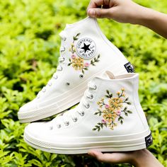 Personalized Wedding Sneakers for Bride and Groom, Wedding Flowers Embroidered Platform Shoes for Wedding, Bridal Flowers Embroidered Converse Custom, Gift for Her 💚 Immerse yourself in the intricate craftsmanship as we lovingly hand embroider rustic flowers onto your chosen Converse pair 💚 🌿 The listed price encompasses both the Converse Shoes and the showcased Embroidery Designs. 1. MANUFACTURING PROCEDURE 🌿 Upon receiving your order, we initiate the shoe preparation process. If your chose Spring Wedding Shoes With Embroidery And Closed Toe, Spring Wedding Shoes With Embroidered Closed Toe, White Lace-up Sneakers With Appliques, Spring Embroidered Canvas Shoes With Round Toe, White Embroidered Closed Toe Wedding Shoes, White Sneakers With Appliques For Summer, Embroidered Round Toe Wedding Shoes, White High-top Sneakers With Floral Embroidery, Wedding Low-top Sneakers With Floral Embroidery