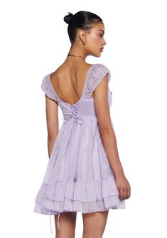 cuz that’s on you babe. This fully lined babydoll dress has a sateen construction with an empire waist, rosette appliques on the bust, sheer cap sleeves, a tiered ruffled hem, a lace-up back design, and a side hook and zipper closure. Purple Babydoll Dress, Purple Cotton Mini Dress With Ruffles, Purple Tie-back Mini Dress, Dolls Kill Fairy Dress, You Oughta Know, Dolls Kill Dress Black, Crochet Shop, Pride Outfit, Babydoll Dress