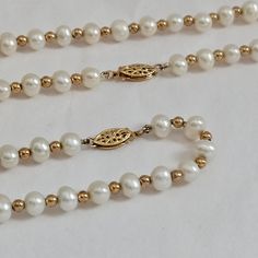 This stunning pearl and gold set features an 18" necklace and a 7.5" bracelet. Each piece is crafted with high-quality 5mm pearls and accented with 2mm 14K gold balls. The elegant design and intricate gold clasps make this set a timeless addition to any jewelry collection, perfect for weddings, anniversaries, or special occasions. Necklace length: 18 inches Bracelet length: 7.5 inches Pearl size: 5mm Gold ball size: 2mm Clasp: Delicate 14K gold filigree clasp This beautiful set comes ready to gi Gift Making, Necklace And Bracelet Set, Gold Pearl Necklace, Necklace And Bracelet, Gold Filigree, Pearl Earrings Dangle, Wedding Jewelry Sets, Pearl Size, Gold Set