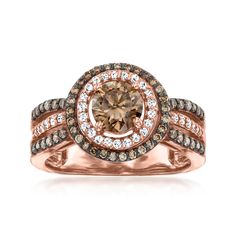 LeVian - Le Vian 1.43ct t. w. Chocolate, Vanilla Diamond Ring Round Cut in 14kt Strawberry Gold. Size 7. With a rich history dating back to the 15th century, Le Vian jewelry is well known for its decadent designs and innovative use of color. This alluring ring spotlights a .90 carat round brilliant-cut brown diamond that gleams at the center of a luxe double border on a three-row band, all studded with more petite round brilliant-cut brown and white diamonds totaling .53 carats. Finely crafted i Chocolate Diamond Engagement Ring Rose Gold, Le Vian Rings, Brown Diamond Ring Fine Jewelry, Le Vian Jewelry, Le Vian Chocolate Diamond Ring, Levian Chocolate Diamonds Rings Jared The Galleria Of Jewelry, Diamond Ring Round, Brown Diamond Ring, Levian Jewelry