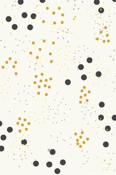 black and gold dots on a white background