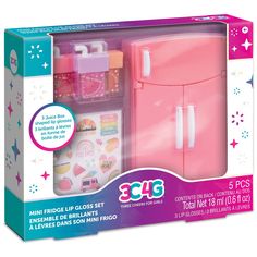 a pink refrigerator and freezer set in a box