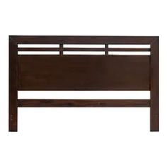 the headboard is made from wood and has metal bars at the top, along with two