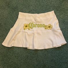 Licensed New Corona Skirt. Never Worn. Unique Style And Very Attractive With Soft Tie In Front With Corona Logo On Lower Left And Full Logo On Back. Only 1 So Move Fast! 2024 Fashion, Only 1, On Back, Unique Style, Womens Skirt, Color White, Skirt, Women Shopping, White