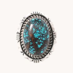 This stunning sterling silver ring boasts a classic southwest design and intricate file-work details. Its natural turquoise adds a touch of natural beauty to any outfit. Expertly crafted, this ring is a statement piece that is sure to impress with its timeless elegance. Sterling Silver Ring Natural Turquoise 1 1/4" by 1" Ring Face Size 8 Artist: E. Secatero for T.Skies (hallmarked) Southwest Design, Native Jewelry, Natural Turquoise, Statement Pieces, Sterling Silver Ring, Timeless Elegance, Silver Ring, Sterling Silver Rings, Natural Beauty