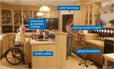 a woman in a wheel chair is at the kitchen counter while an elderly man stands next to her