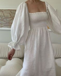 #dailysleeper, #sleeper, #beachwear, #loungewear, #linen, #dress, #loungedress, #beachdress, #linendress Square Neck Linen Midi Dress With Smocked Back, White Dresses With Elastic Sleeves For Spring, White Spring Dresses With Elastic Sleeves, White Spring Dress With Elastic Sleeves, Feminine Summer Midi Dress With Smocked Cuffs, Feminine Midi Dress With Smocked Cuffs For Summer, Summer Feminine Midi Dress With Smocked Cuffs, Summer Midi Dress With Gathered Sleeves For Gatherings, White Linen Square Neck Midi Dress