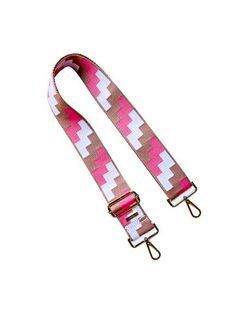 a pink and white leash with two metal clips on it's ends, one has a