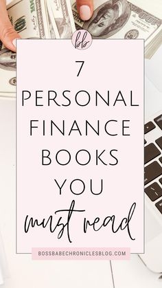 a woman's hand holding a sign that says 7 personal finance books you must read