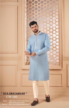 *PRODUCT DETAILS:- Get an absolute regal look apt for any event in this Soft blue cotton leno kurta pajama for men. Feel comfortable and in sync with the latest in fashion. *THREAD TALE:- This Kurta Set has been made by our karigars (craftsmen) with a lot of love and eye for detail. *FEATURES:- Color:  Soft Blue Fabric: 100% pure cotton leno Design Type: Neck Embroidery for kurta only Items Included:  (i)  Kurta ,                                (ii) Pant waist half elastic (100% heavy tensile cotton) Wash Care: Dry Clean Only Disclaimer Text: Product color may slightly vary due to photographic lighting sources or your monitor/screen settings. Blue Traditional Fit Kurta For Festive Occasions, Festive Blue Traditional Fit Kurta, Festive Light Blue Straight Kurta, Light Blue Cotton Kurta With Chikankari Embroidery, Light Blue Cotton Kurta For Diwali, Blue Long Sleeve Kurta For Diwali, Light Blue Straight Kurta For Diwali, Light Blue Cotton Traditional Wear For Eid, Eid Light Blue Cotton Traditional Wear